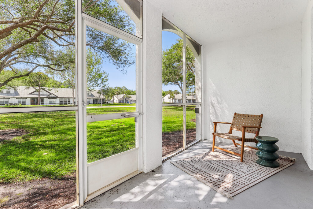 Outdoor covered patio with access to the backyard